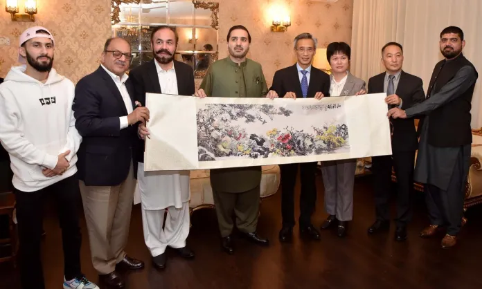 Deputy Chairman Senate of Pakistan, Senator Mirza Muhammad Afridi presented Souvenir to Ambassador Lin Songtain President of the Chinese People’s Association for Friendship with Foreign Countries (CPAFFC) during his call on him. (L-R) Syed Zafar Ali Shah, Syed Ali Nawaz Gilani, Secretary-General PCFA Haji Muhammad Afridi, Ambassador Lin Songtain, Chinese Officiating Ambassador Pang Chunxue.