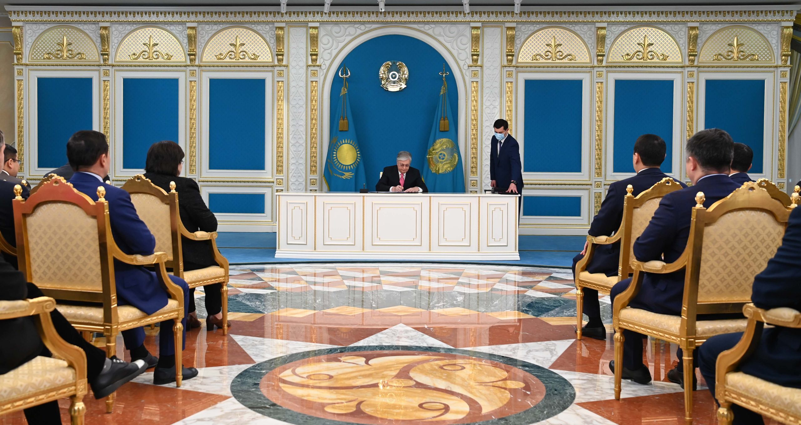 President of Kazakhstan signing amendments in law.