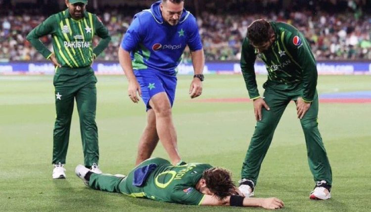 Shaheen Shah Afridi laying on the ground after