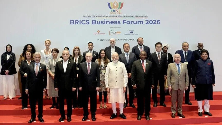 Delegates posing for a group photo at the BRICS Business Forum 2026 in New Delhi, India