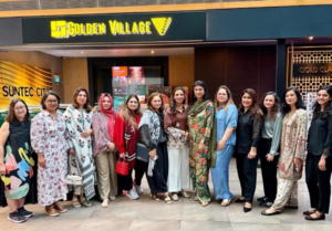 High Commissioner Rabia Shafiq and attendees pose outside Golden Village cinema for a screening of The Legend of Maula Jatt