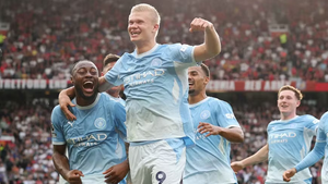 Haaland Sinks United as Ten-Man City Win Derby