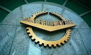 Asian Development Bank (ADB) logo mounted on a stone wall