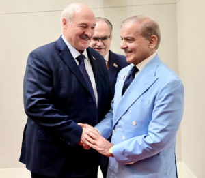 Belarusian President Aleksandr Lukashenko shakes hands with Pakistani Prime Minister Shehbaz Sharif