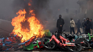 Paris Bans Protests as Macron Hits Back at Trump Over Riots